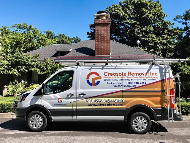 Palm Coast Chimney Sweep technician removing creosote safely in Palm Coast, FL