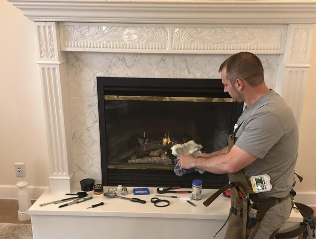 Palm Coast Chimney Sweep performing fireplace maintenance in Palm Coast, FL